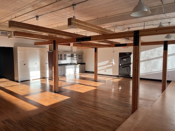 Devil Mask Studio interior facing west with the suspension frame prominently featured